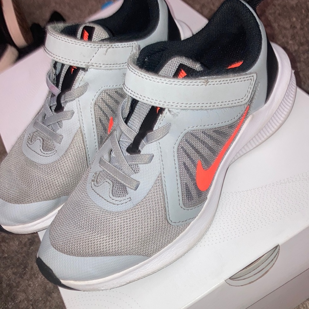 Boys Nike orange, and grey. Size 2Y